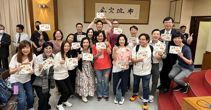 A group of people posing for a group photo