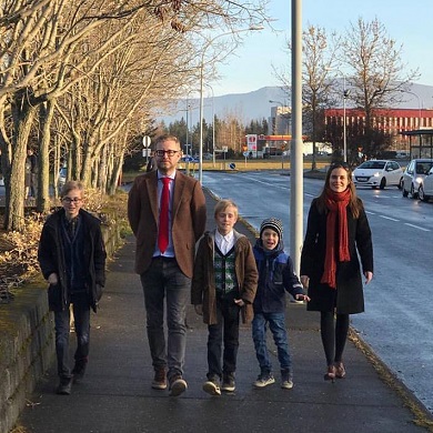 A family going for a walk.