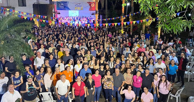 A large group of people looking up for a photo.