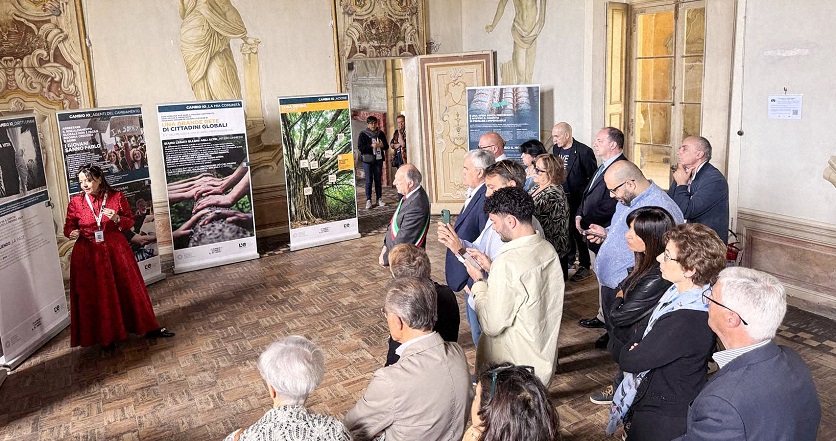 People look at a exhibition panels.